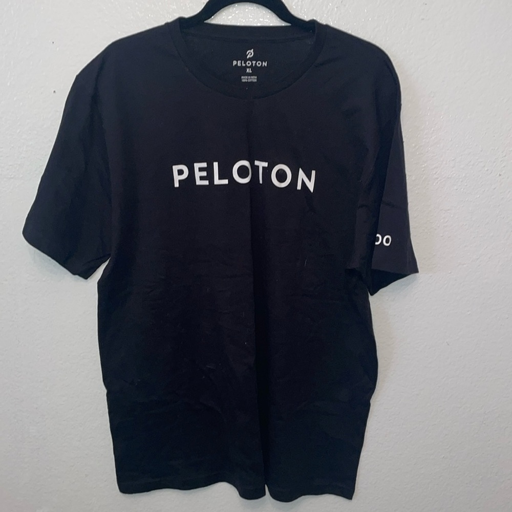 Brand new Peleton century ride tshirt . Black& white. Short sleeve.  X-Large.